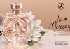 Perfume feminino da Mercedes encontra inspiração em três mulheres que fizeram história Frasco do perfume feminino da Mercedes I Am Mercedes junto a flores brancas