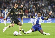 Porto vs Manchester City decidido por Haaland no Dragão Porto vs Manchester City com disputa de bola entre jogadores no Estádio do Dragão